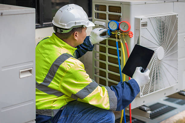 Professional Hvac technician working in Holly Springs, GA